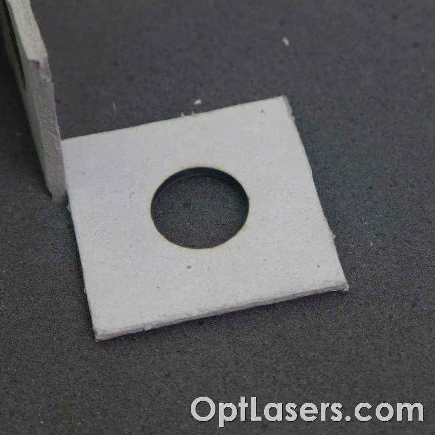 Binder board laser cutting